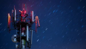 A 5G cell tower with red lights