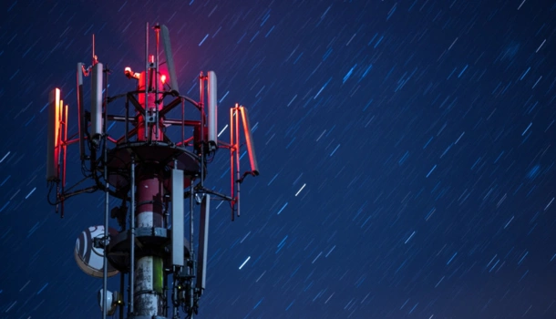 A 5G cell tower with red lights